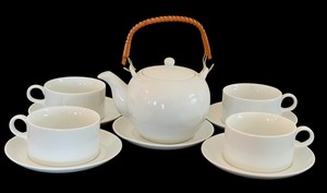 lot 115 image: Lovely White Ceramic Tea Pot with Woven Rattan Hande Including Mugs and Saucers