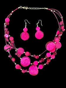 lot 214 image: Beautiful Bright Pink Necklace and Earring Set