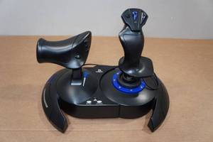 lot 60 image: Thrustmaster Hotas Flight Stick and Throttle for PlayStation