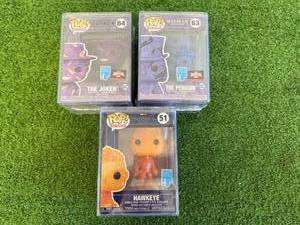lot 137 image: Funko POP Art Series The Joker, The Penguin & Hawkeye
