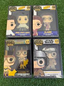 lot 262 image: Funko POP Pins - Seinfeld Jerry & Elaine, Batgirl & Star Wars Young Anakin Skywalker