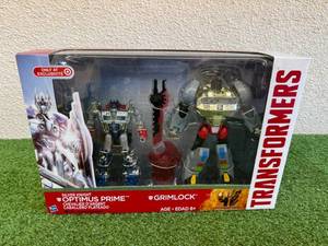 lot 296 image: Transformers Silver Knight Optimus Prime & Grimlock