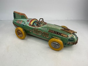 lot 31 image: Yonezawa Tin Friction Atom Toy Race Car