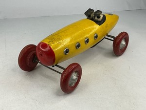 lot 37 image: Ted Toyler Boat Tail Wood Indy Race Car Pull Toy