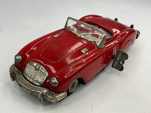 lot 43 image: Red Sanshin Wind up Tin Toy Car