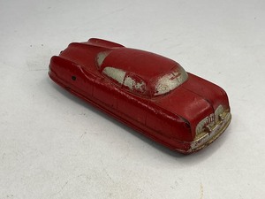 lot 74 image: Auburn Rubber Futuristic Sedan Toy Car