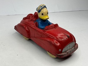 lot 77 image: Sun Rubber Donald Duck and Pluto Toy Car