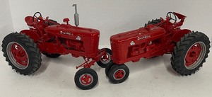 lot 32 image: Lot of 2 Vintage Plastic Farmall Tractors