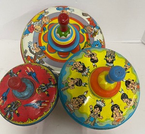 lot 44 image: Tin Lithograph Ohio Art Co. Spinning Tops with Wood Handles Space Man Ten Little Indians 3 Little Pigs