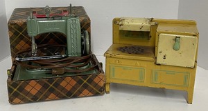 lot 47 image: Betsy Ross Miniature Electric Sewing Machine with Case and Childrens 1940s Electric Stove