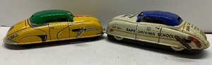 lot 68 image: Lot of 2 Tin Lithograph Marx Toys Wind Up Cars both with Keys one Safe Driving School Marx Toys