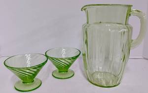 lot 26 image: Vintage Green Uranium Depression Glass Pitcher Anchor Hocking and Two Swirl Sherbet GlassesFooted Bowls