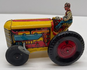lot 86 image: Vintage Marx Tin Lithograph Wind Up Tractor with Farmer Works