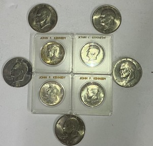 lot 104 image: Four Kennedy Half Dollars 64-67 in cases circulated condition