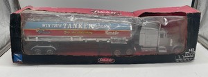 lot 169 image: New in Box Peterbilt Kum & Go Semi Truck and Trailer