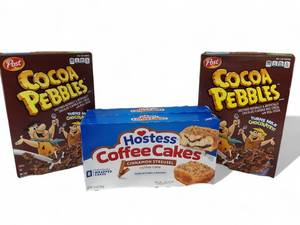 lot 36 image: Breakfast Lot    Post & Hostess  (2)  Post Cocoa Pebbles  & (2) Hostess Coffee Cakes