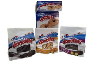lot 39 image: Hostess  Jumbo Donettes glazed Blueberry ,Double Chocolate , Crunch and Frosted mini donuts