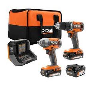 lot 30 image: RIDGID 18V Cordless 2-Tool Combo Kit with 12 in. DrillDriver, 14 in. Impact Driver, (3) Batteries, Charger, and Bag Customer Returns See Pictures