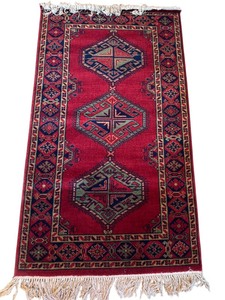 lot 11 image: Handwoven Red Area Rug with Geometric Pattern, 60 x 35 Inches