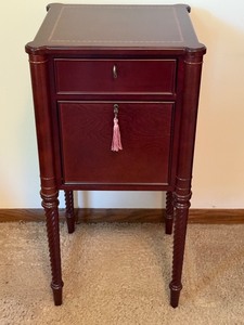 lot 12 image: Bombay Company Mahogany-Finish Accent Table with Drawer and Cabinet