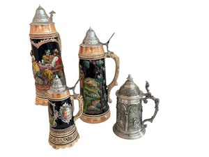 lot 20 image: Set of 4 German Beer Steins with Pewter Lids, One with Musical Feature
