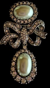 lot 41J image: Metropolitan Museum Faux Pearl and Cubic Zirconia Bow Brooch