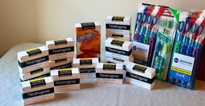 lot 124 image: Lot of 12 Neutrogena Transparent Facial Bars and 10 Assorted New Toothbrushes