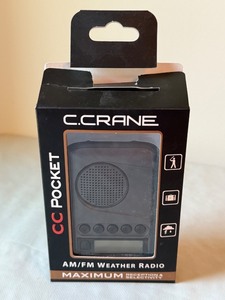 lot 128 image: C. Crane CC Pocket AMFM Weather Radio