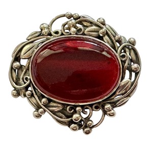 lot 13R image: Hazel Black Cranberry Glass Brooch MMA Reproduction