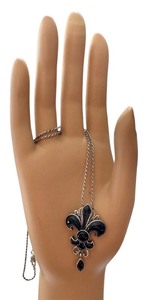 lot 68R image: Sterling Silver 17in Chain with Fleur-de-Lis Black Pendant