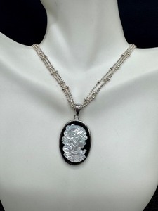 lot 168 image: Sterling Silver Cameo Pendant Necklace with 20 Inch Chain