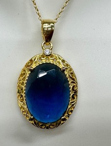 lot 182 image: Sterling Silver Blue Oval Pendant Necklace with Adjustable Chain