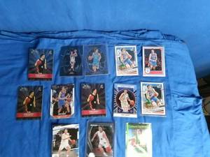 lot 96 image: 13 Josh Giddey Cards. Many are Rookie Cards