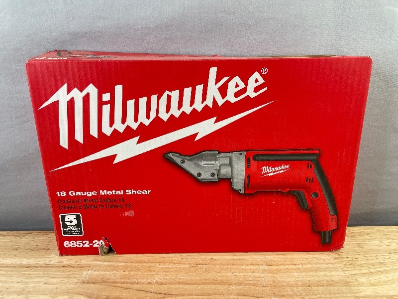 lot 12A image: Milwaukee 6.8 Amp 18-Gauge Shear $249 Retail - Brand New
