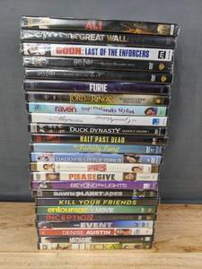 lot 106G image: 24 Brand New DVD Movies Harry Potter, Lord of the Rings, Duck Dynasty, and More