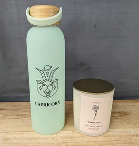 lot 148 image: Teal Capricorn Glass Water Bottle and January Carnation Soy Candle - Brand New