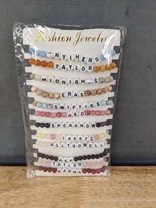 lot 63G image: 12 Taylor Swift Friendship Beaded Bracelets - Brand New