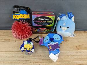 lot 258 image: 5 Youth Toys Koosh Ball, Sonic, Squishmallow, Disneys Stitch, Melissa and Doug Scratch Art - Brand New