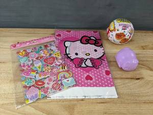 lot 302 image: Hello Kitty Mini Verse Make It Mini Food Toy Set, Stickers, and Tablecloths - Brand New