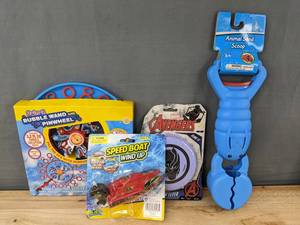 lot 306 image: 4 Kids Outdoor Toys Bubble Wand, Marvel Cap Flyer, Speed Boat, Sand Scoop - Brand New
