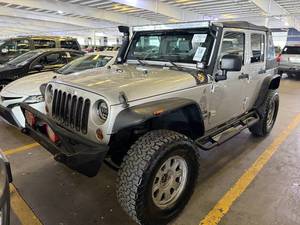 lot 6 image: 2010 Jeep Wrangler Unlimited Sport 4x4