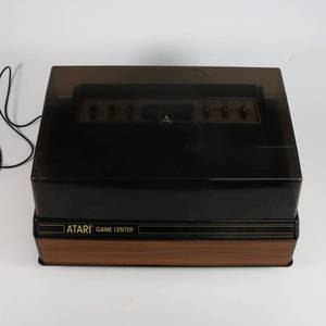 lot 31 image: Atari Entertainment Game Center w Controllers & 13 Games