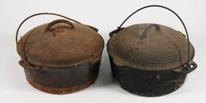 lot 54 image: Vintage Cast Iron Pots w Lids Lot of 2