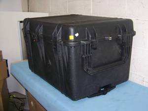 lot 61 image: Large Heavy Duty Foam-Lined ATA-Rated Waterproof Travel Equipment Case with Telescoping Handle & Wheels