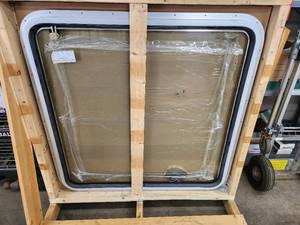 lot 31 image: RV or Trailer Replacement Window with Aluminum Frame, 42x40 Inch