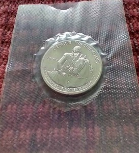 lot 9 image: 1982 Uncirculated Silver Washington Commemorative Half Dollar
