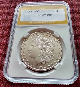 lot 26 image: 1884-CC Morgan Dollar - PGA MS65