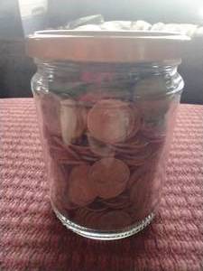 lot 120 image: Jar of Wheat Pennies