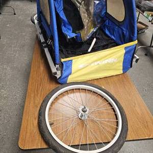 lot 124 image: Schwinn Kids Behind Bike Stroller