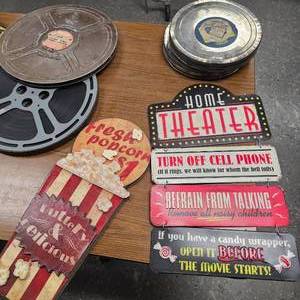 lot 126 image: Novelty Theatre Signs with old Movie Reels
